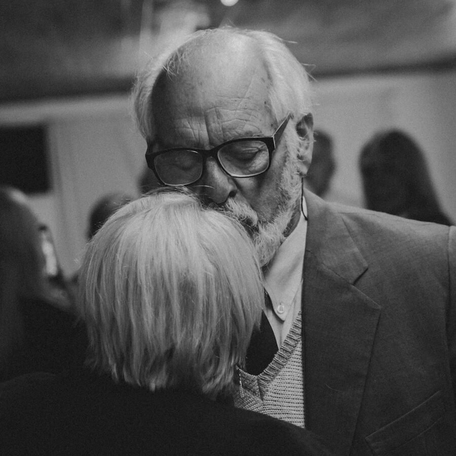 a black and white photo of a man and a woman